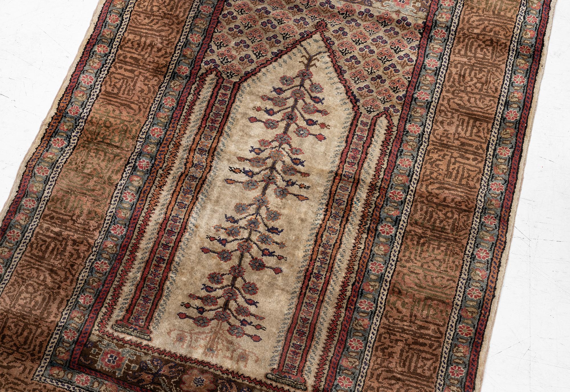 A Kaiseri prayer rug, c. 135 x 90 cm.