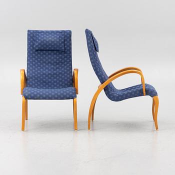 Markku Pakkanen, a pair of 'Harlekiini' armchairs, Asko, Finland, late 20th Century.