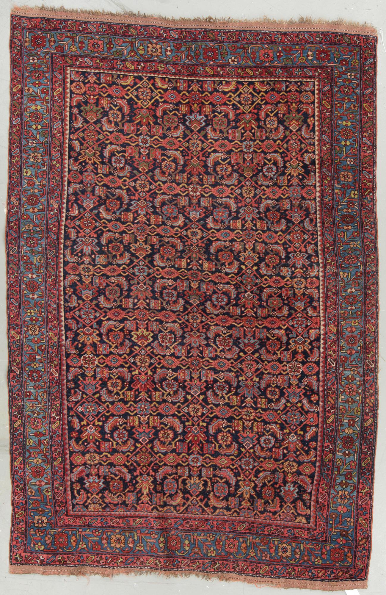 A semi-antique west persian around 212 x 143 cm.