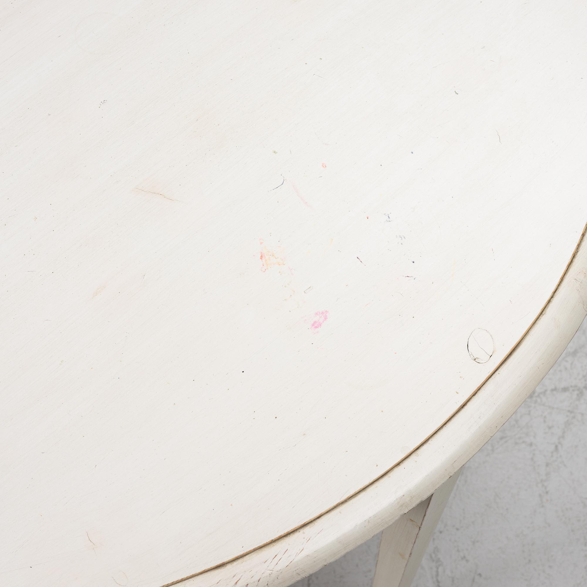 A Gustavian style dining table, late 20th Century.