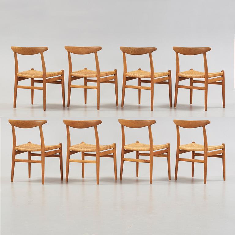 Hans J. Wegner, A set of eight oak chairs by Carl Madsen, Denmark 1950-60's.