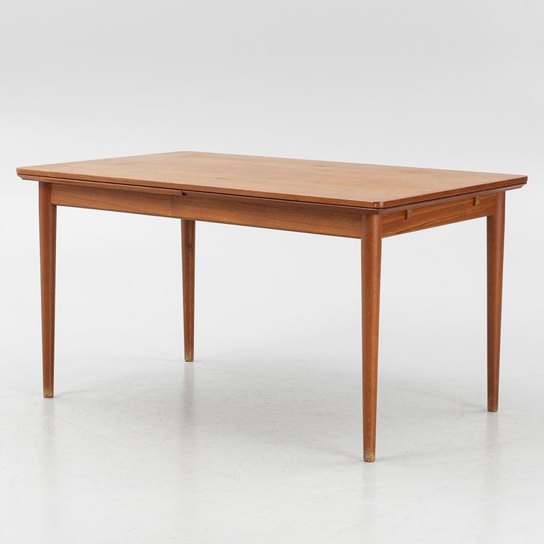 A teak-veneered dining table, 1960's/70's.