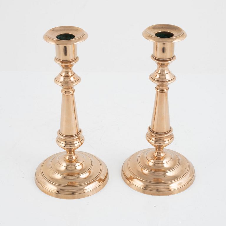 A pair of brass candle sticks, model 39 from Skultuna Bruk, Sweden.
