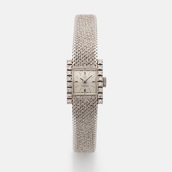 Omega, 18K white gold and brilliant cut diamond ladies watch.