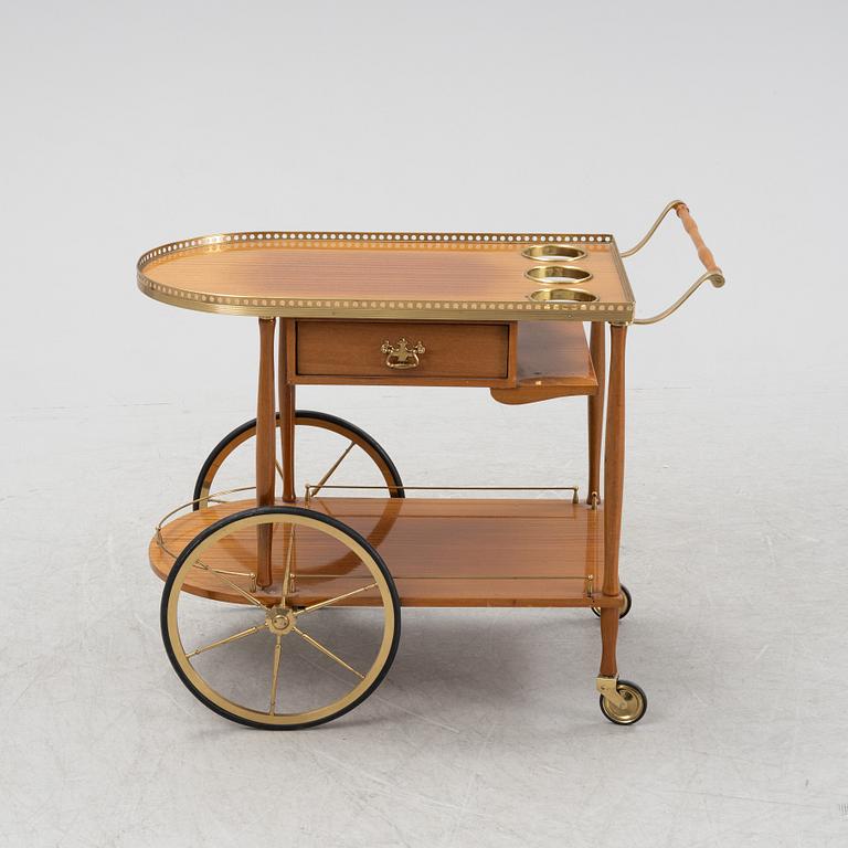 A mahogany-veneered serving trolley, mid 20th Century.