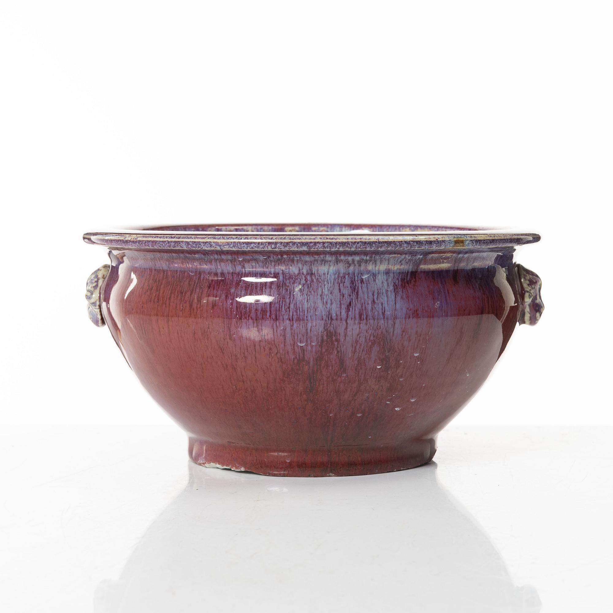 A Chinese sang de boeuf stoneware bowl / flowerpot, 20th century.