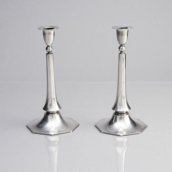 A pair of Swedish silver candlesticks, bearing the mark of GAB Stockholm, 1934.