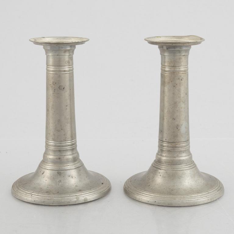 A pair of pewter candle sticks, model A702, Firma Svenskt Tenn, Sweden, 1928.