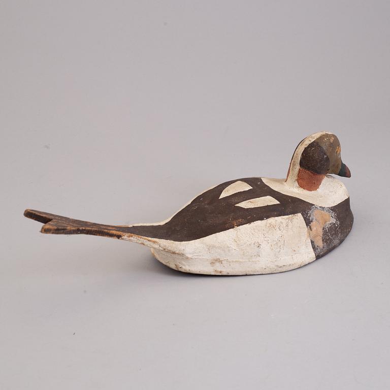 4 painted wooden ducks from the 20th century.