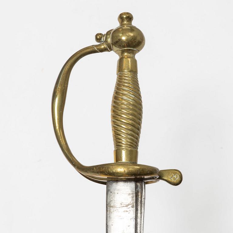A Swedish police sabre and cutlass, with scabbards.