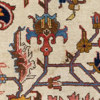 An antique Tabriz carpet, c. 365 x 280 cm.