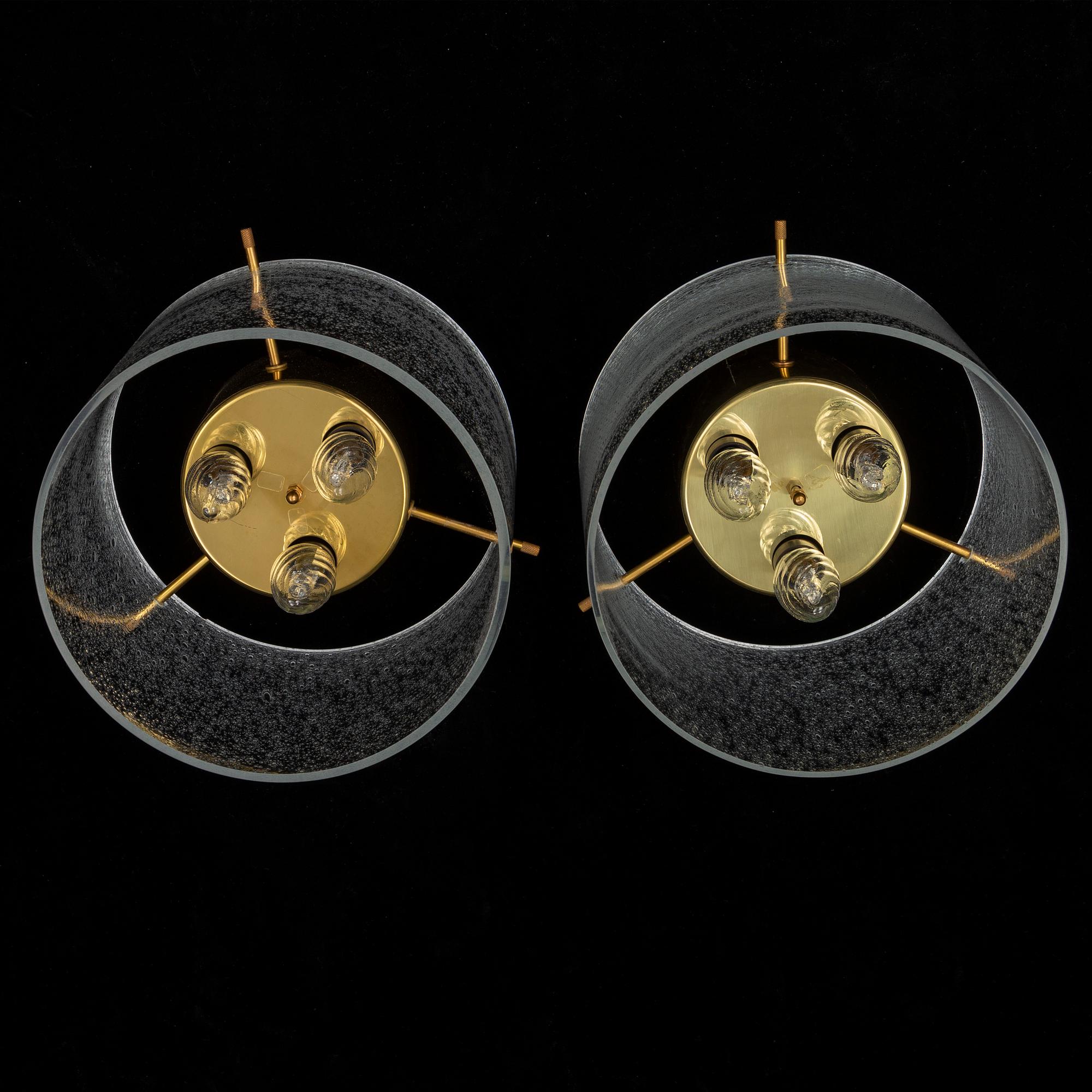 A pair of late 20th Century ceiling light by Kjell Munch.