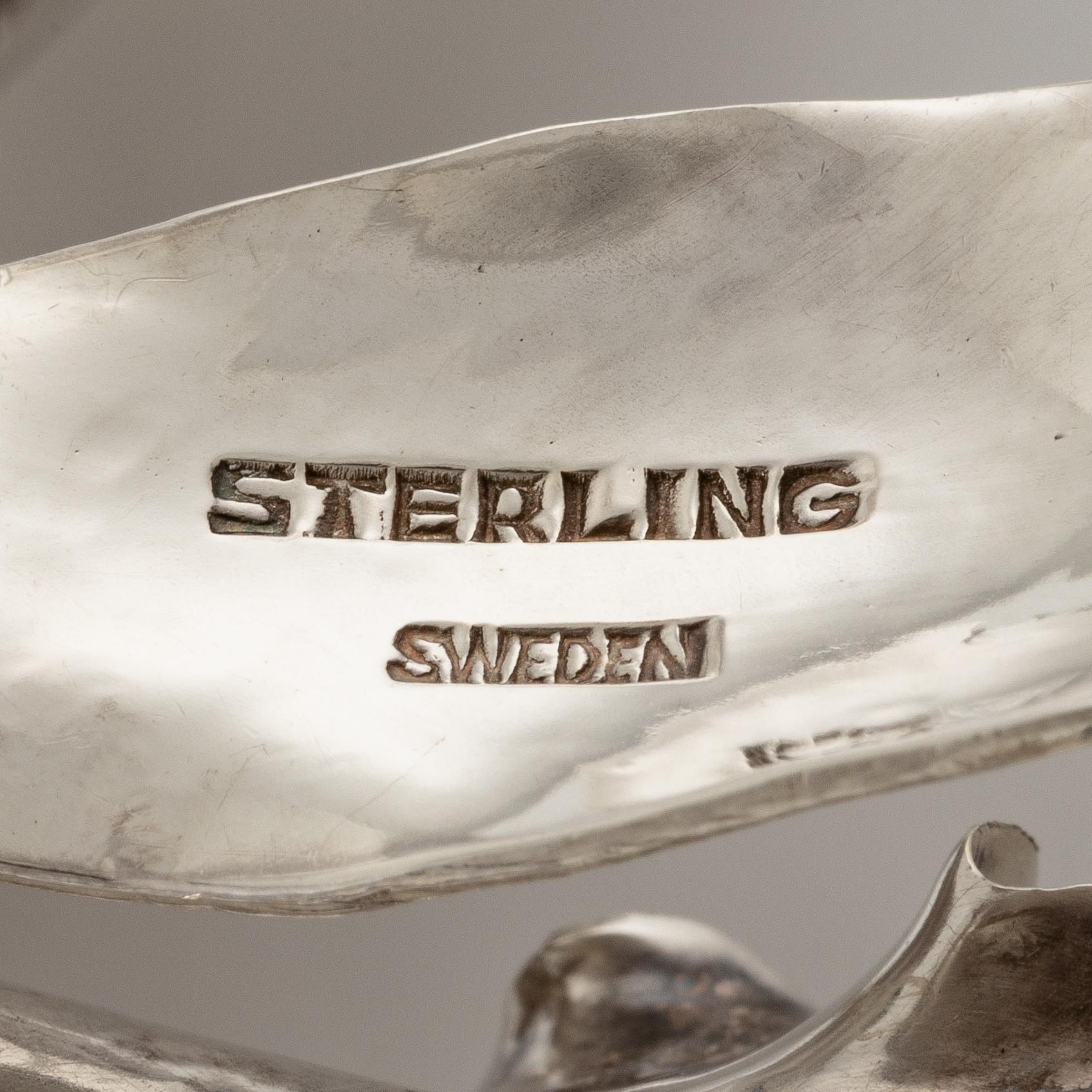 Wiwen Nilsson, a brooch, in the shape of a lily, sterling silver, Lund 1961.