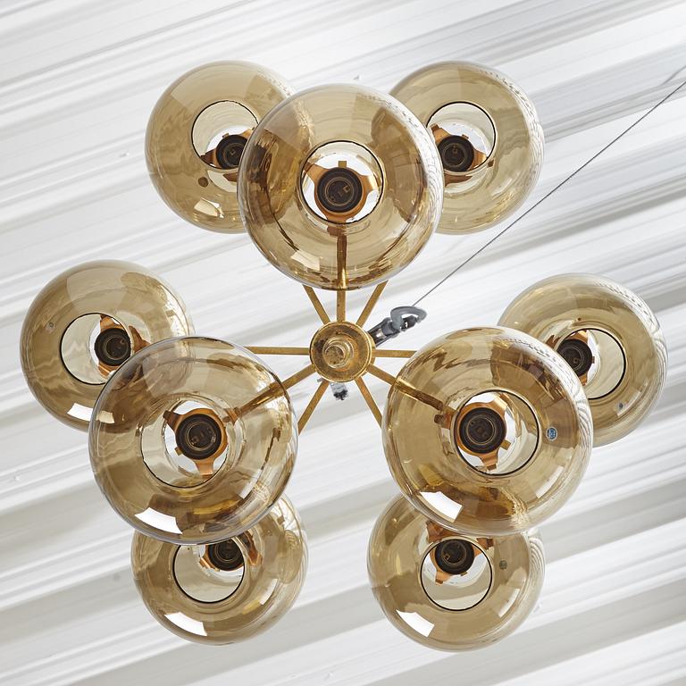 HANS-AGNE JAKOBSSON, a brass and glass nine-light ceiling light from Markaryd, second half of the 20th century.
