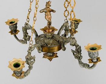 TAKAMPEL, patinerad metall och mässing, 1800-tal. Diam 40.