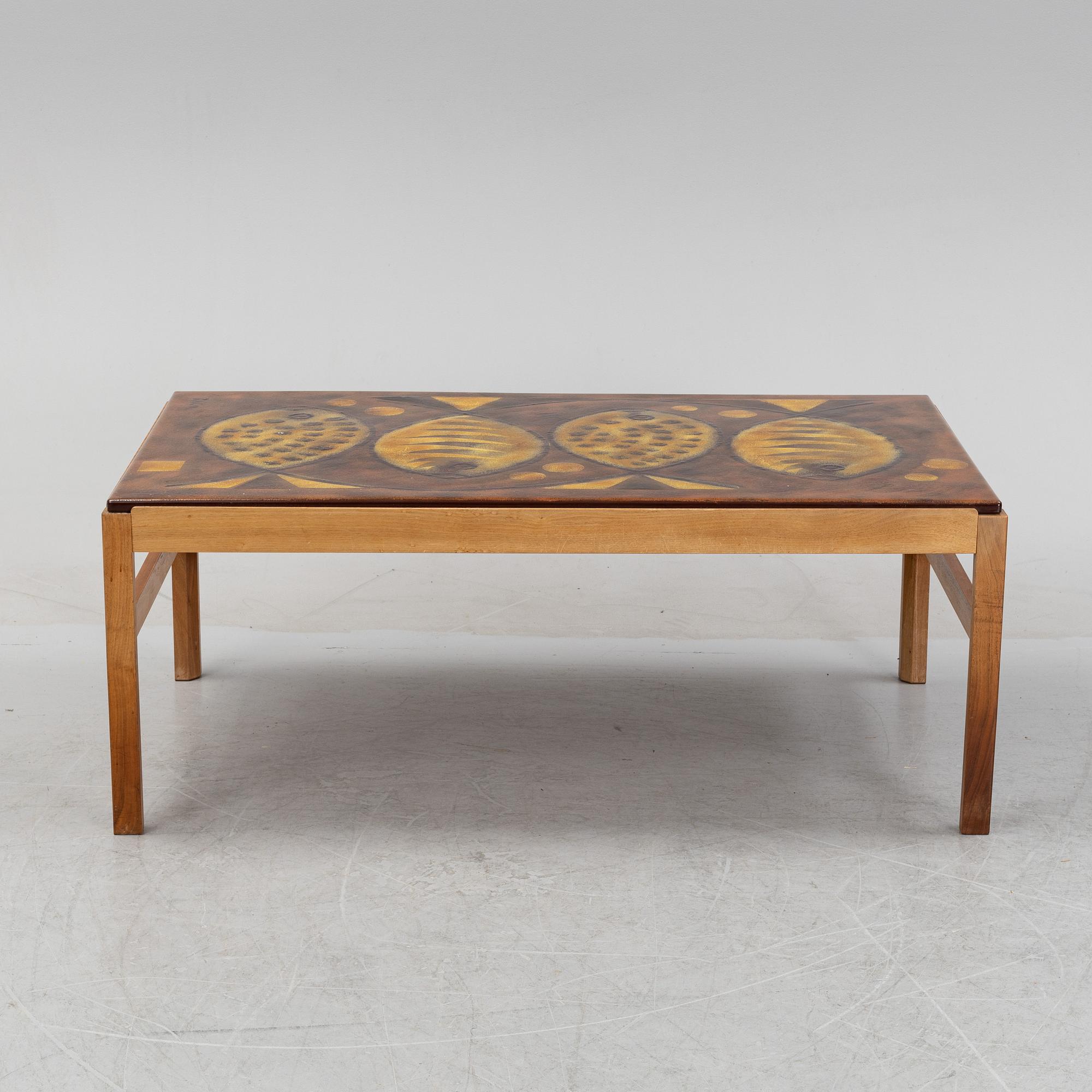 A walnut coffee table, 1960's/1970's, signed Baco.