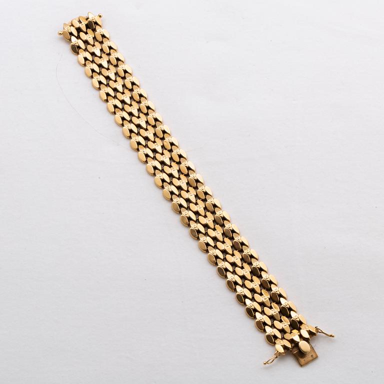 ARMBAND 18K guld.