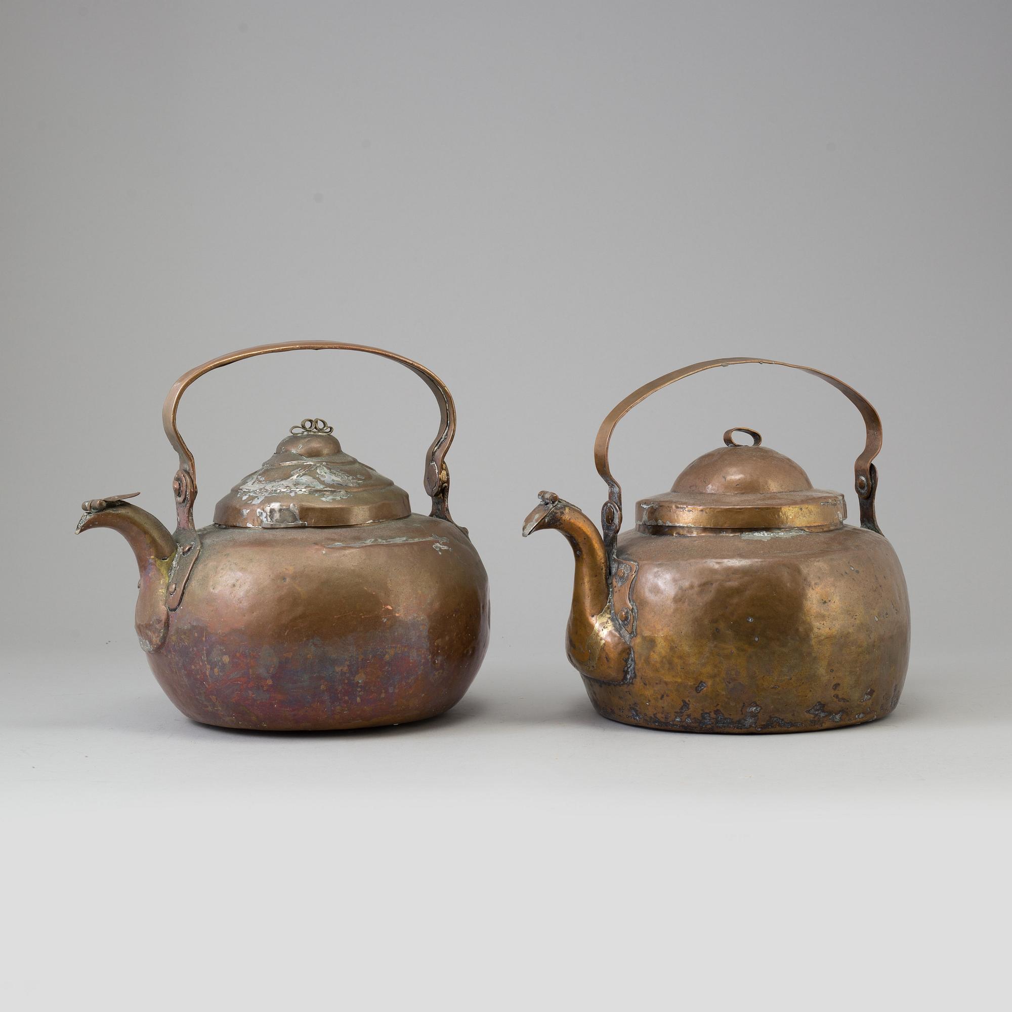 TWO COPPER COFFEE POTS, 18th-/19th century.