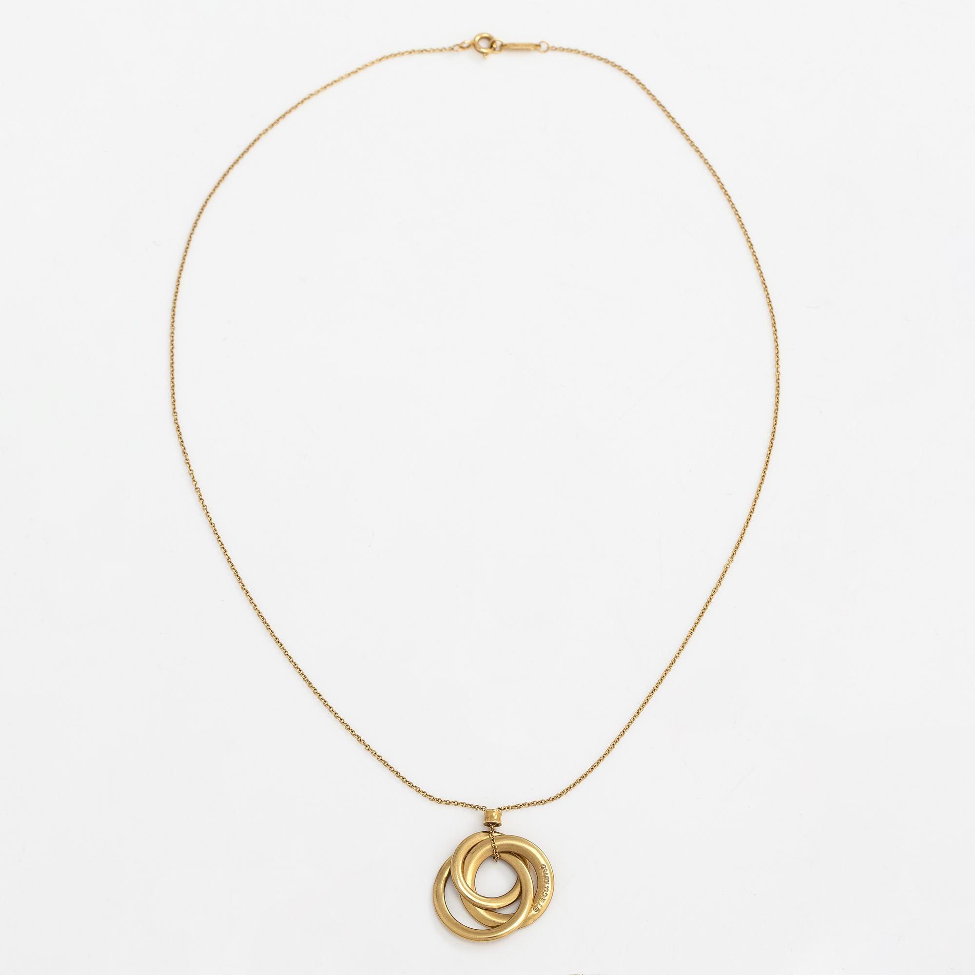 Tiffany & Co, An 18K gold necklace. Marked Tiffany & Co and T & Co.