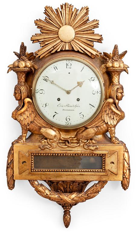 A late Gustavian gilt wood wall clock by E. Rundelius.