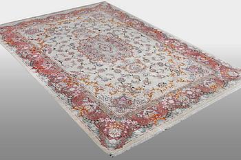 A carpet, Tabriz par silk, 60 Raj, ca 294 x 197 cm.