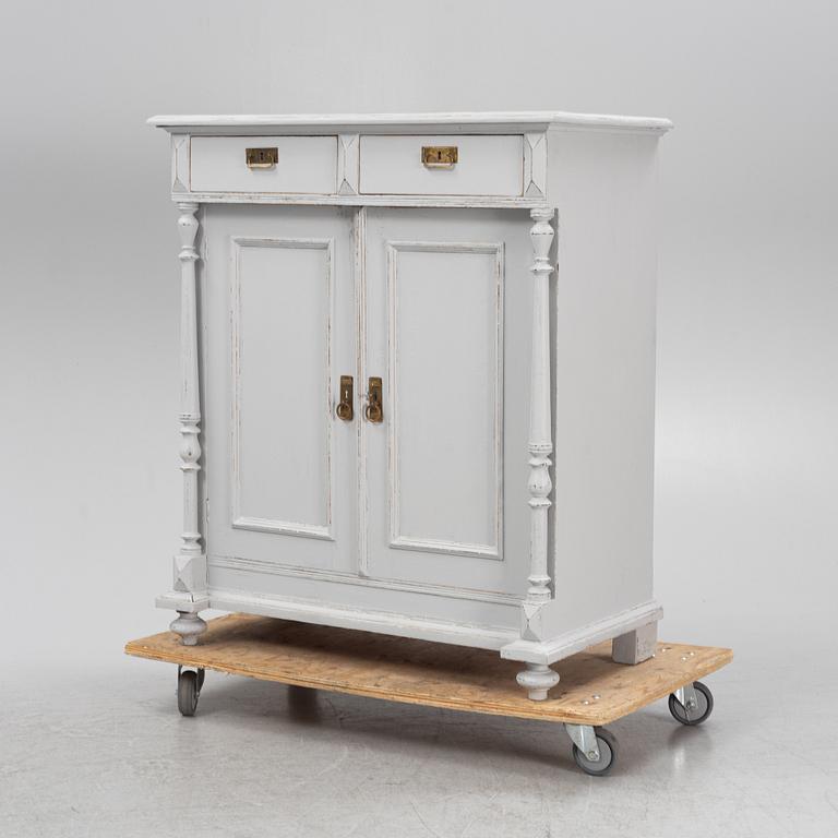 A painted cabinet, late 19th Century.