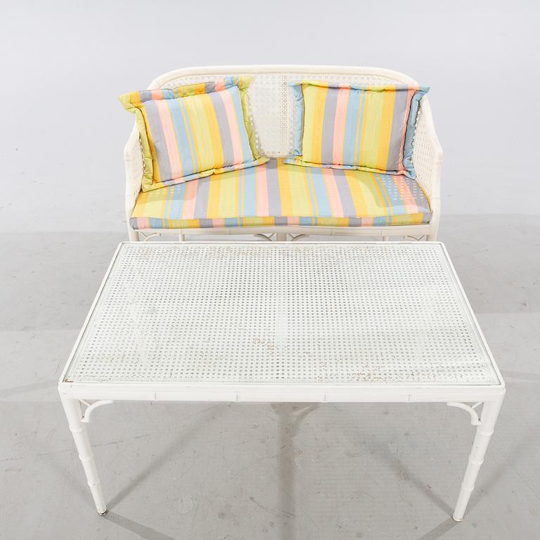 A late 20th century Miranda sofa and table.