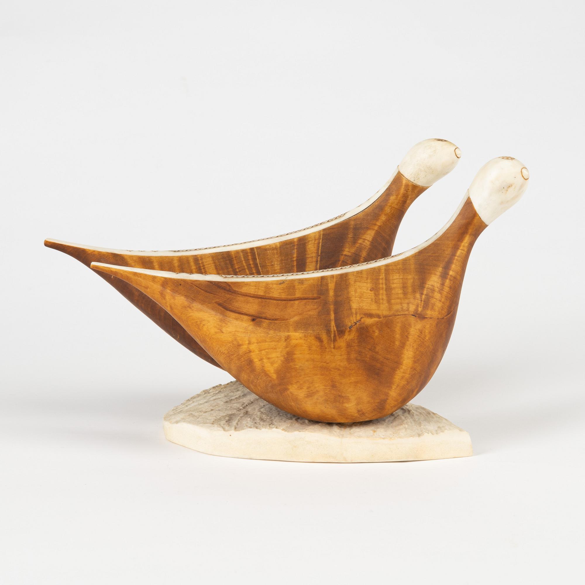 Lars Levi Sunna, sculpture, birch and renideer horn, signed LL Sunna.