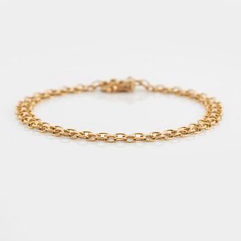 Armlänk, 18K guld, x-länk.