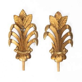 Two pairs of curtain-rod finials, early 19th Century.