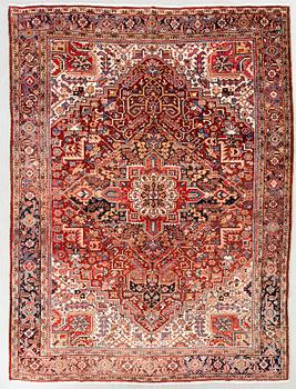 A semi-antique Heriz carpet, North west Persia, c. 366 x 282 cm.