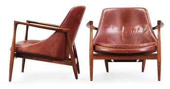 62. A pair of Ib Kofod Larsen palisander and brown leather 'Elisabeth' easy chairs, Christensen & Larsen, Denmark 1950-60's.