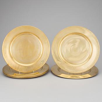 Six brass dishes mid 20th century.