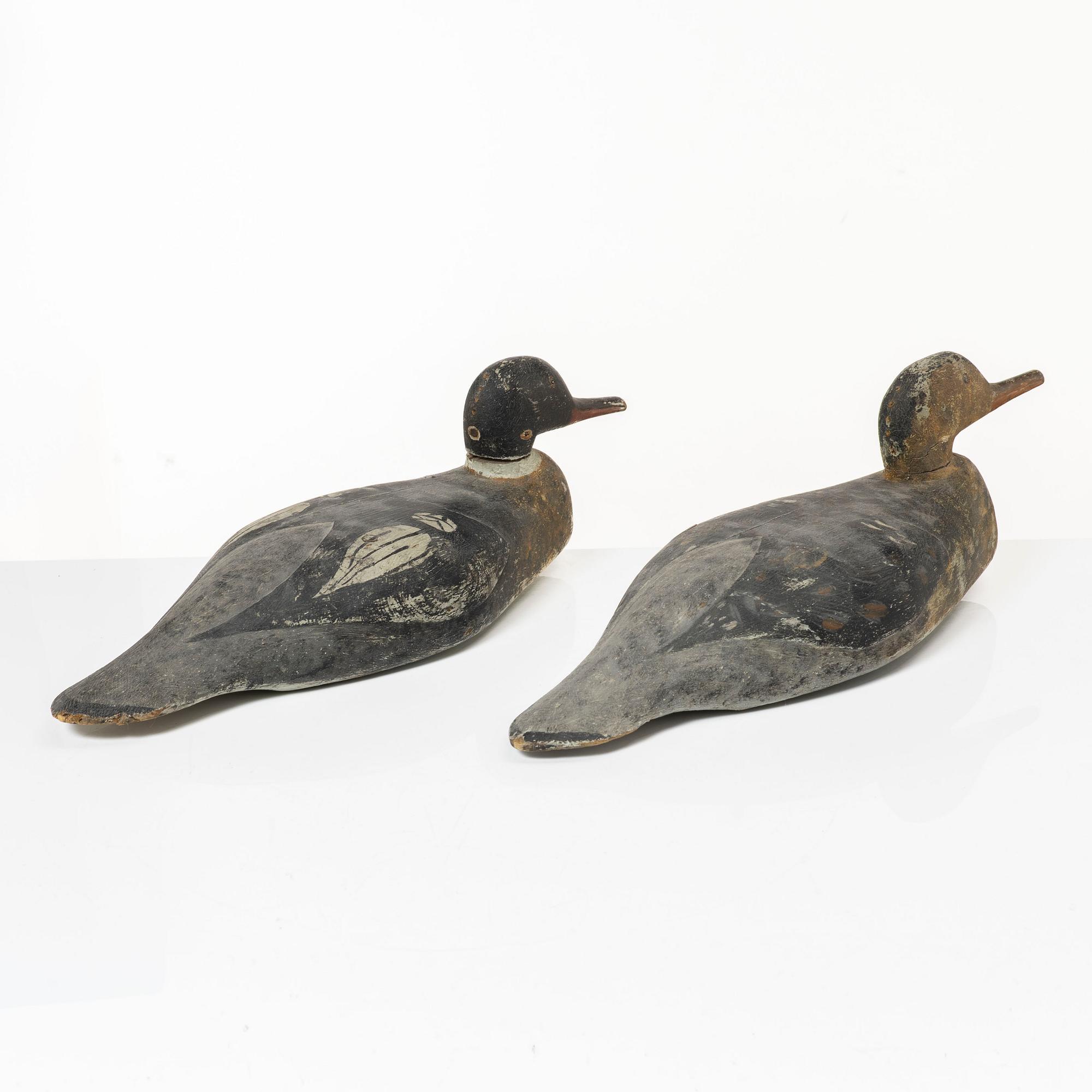 A pair of wood duck decoys, 20th century.