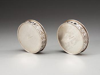 A pair of Swedish 19th century silver coasters, makers mark of Gustaf Möllenborg, Stockholm 1825.