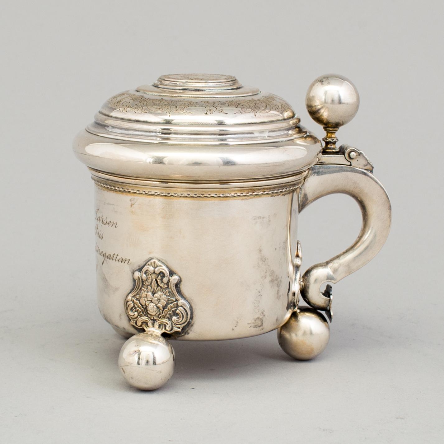 A 20th century parcel-gilt miniature tankard, mark of B Hertz AB, Stockholm 1910.