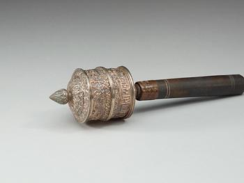 A silver plated prayer wheel, Tibet/Nepal ca 1900.