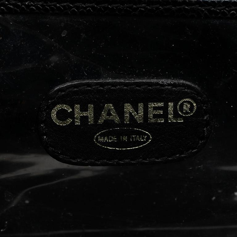 CHANEL, a black caviar leather beauty case.