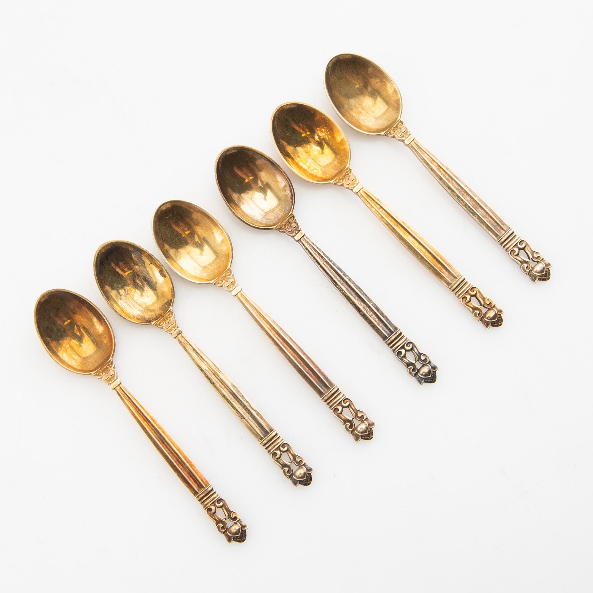 Johan Rohde, spoons 12 pcs "Konge/Achorn" sterling silver for Georg Jensen after 1945.