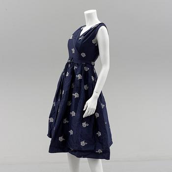 A Christian Dior 1950s midnight blue cocktail dress.