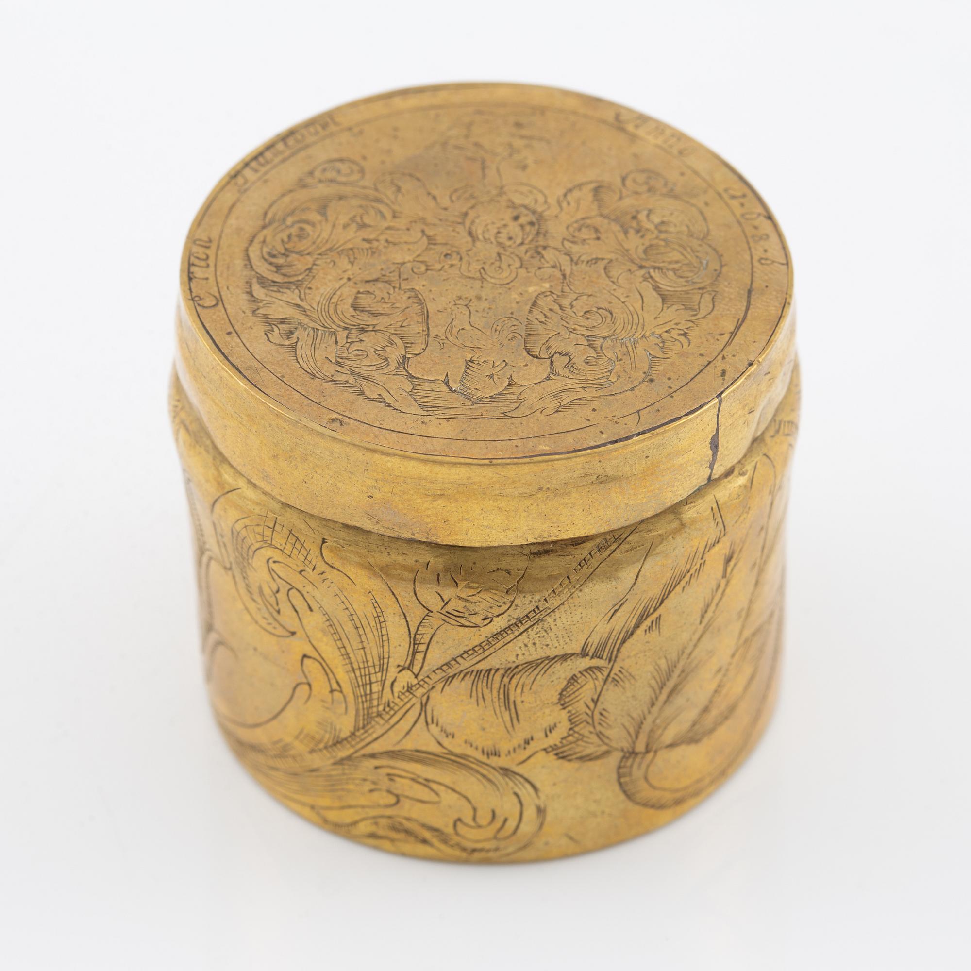 A presumably German baroque brass box, dated 1686.