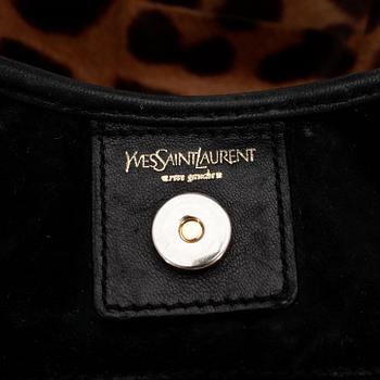 YVES SAINT LAURENT, a leopard and black leather shoulder bag.