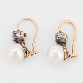 A pair of pearl and rose-cut diamond earrings.