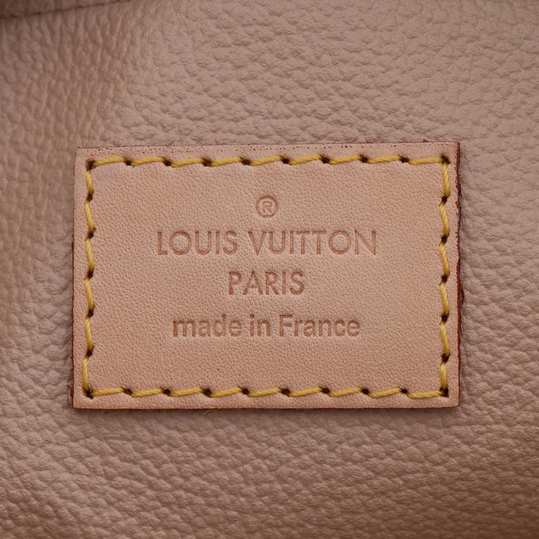 LOUIS VUITTON, a monogram canvas toiletry case.