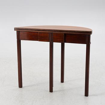 A late Gustavian mahogany games table by J. F. Wejssenburg (master in stockholm 1795-1837).