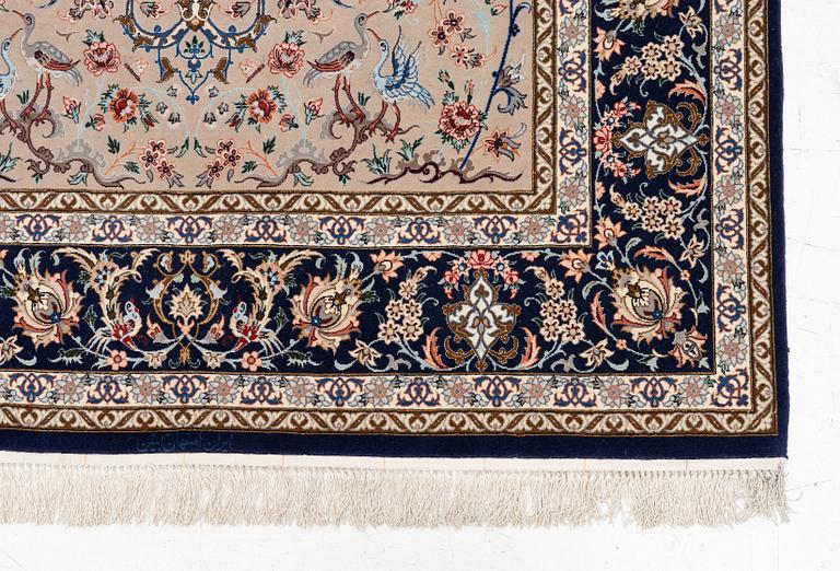 An Isfahan rug, c. 220 x 145 cm.