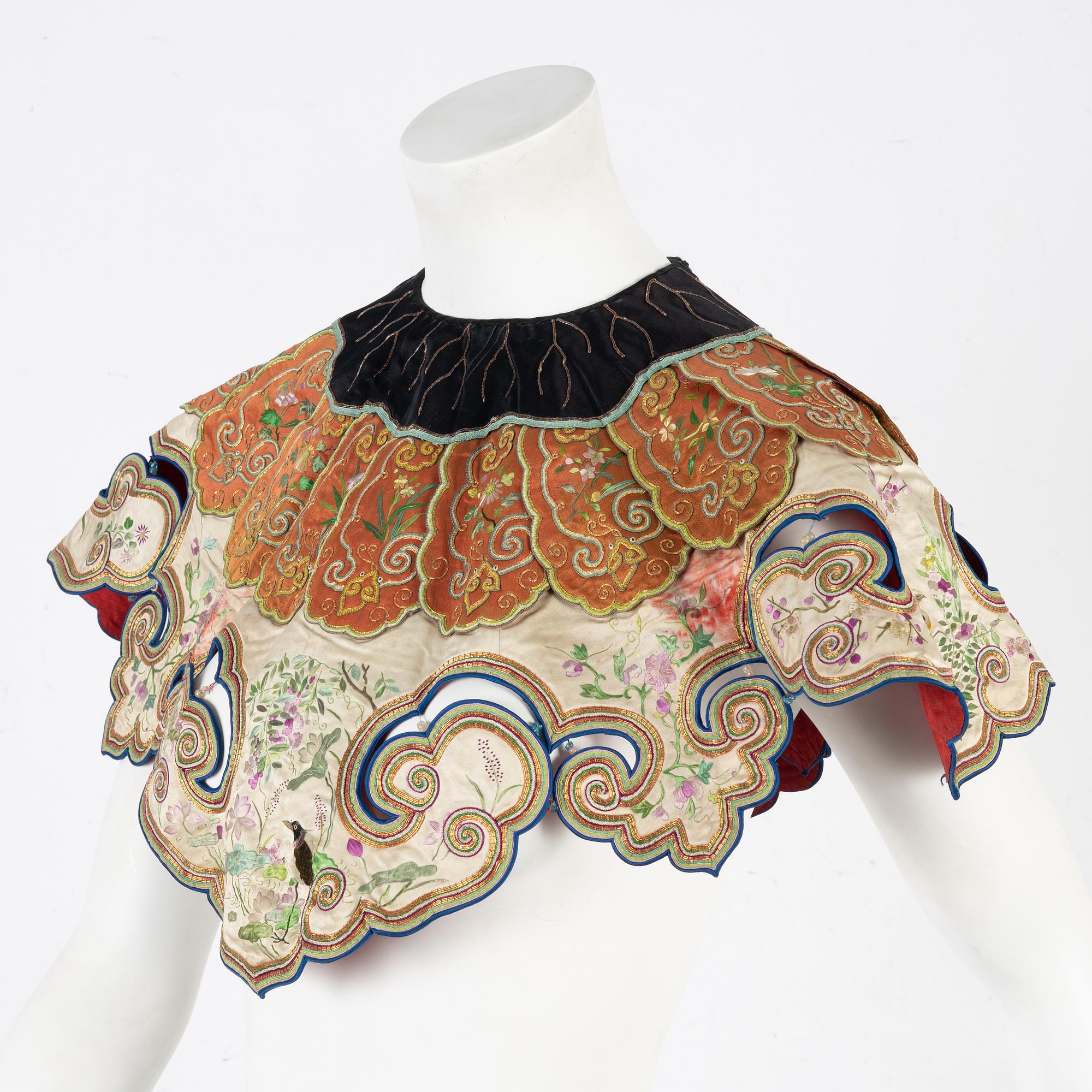 A collar a vest and two Chinese embroidered silk textiles, late Qing dynasty / early 20th century.