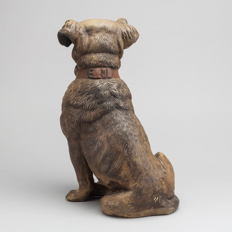 A 20th CENTURY TERRACOTTA DOG.