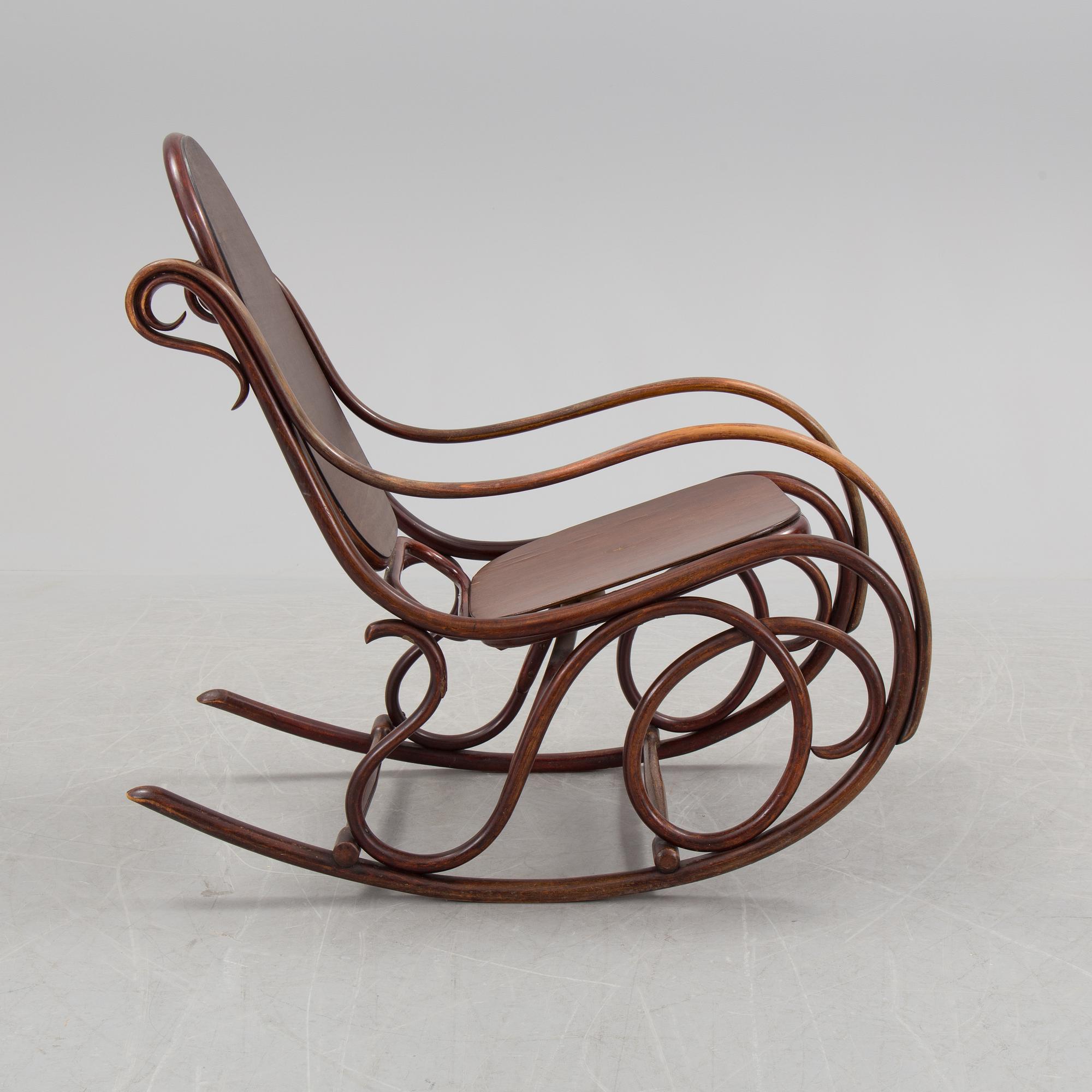 A stained rocking chair by Thonet, about 1900.