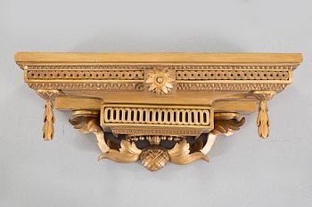 A mantlepiece clock with console from the second half of the 19th century.